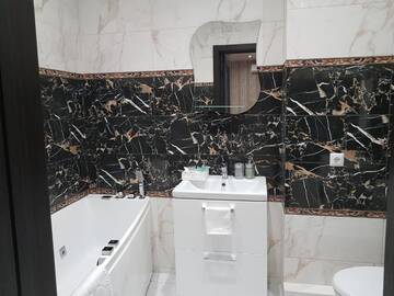 Фото номера Улучшенные апартаменты Апартаменты Apartment near the airport Kiev Zhulyany Киев Жуляны с гидромассажной ванной г. Вишневое 37